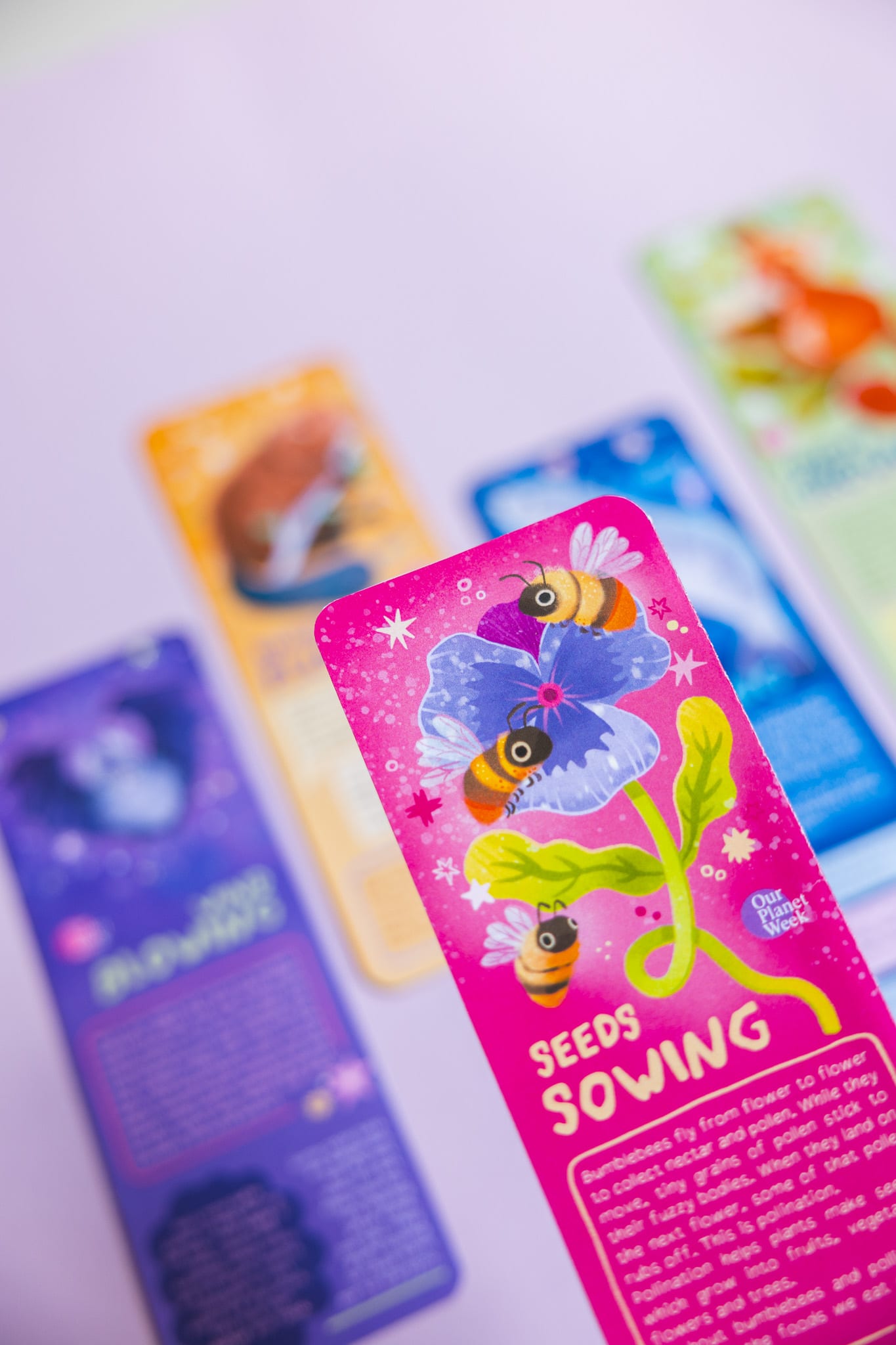 Squirrel bookmark held up, Forests Growing.