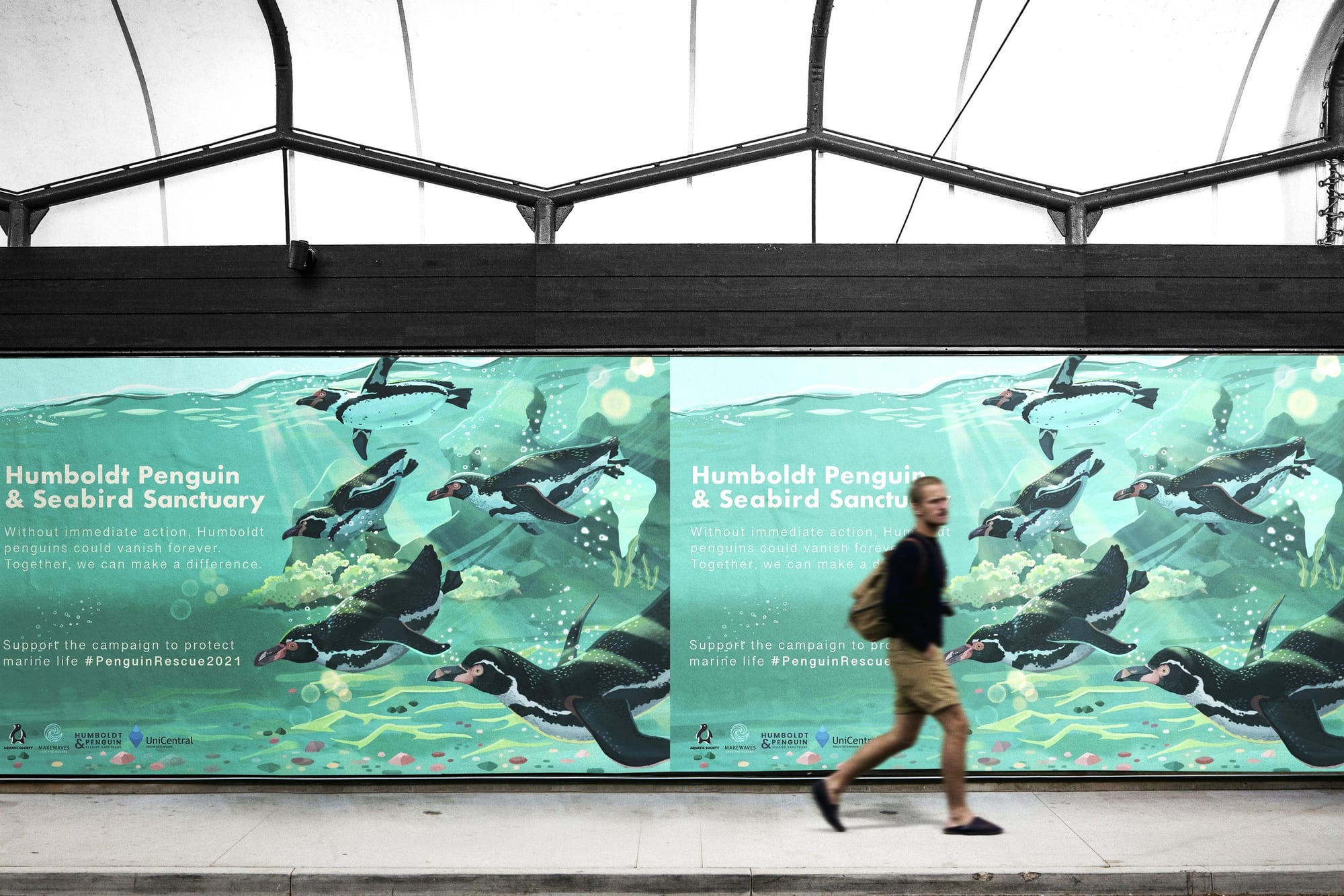 Campaign artwork mocked up on an urban billboard.