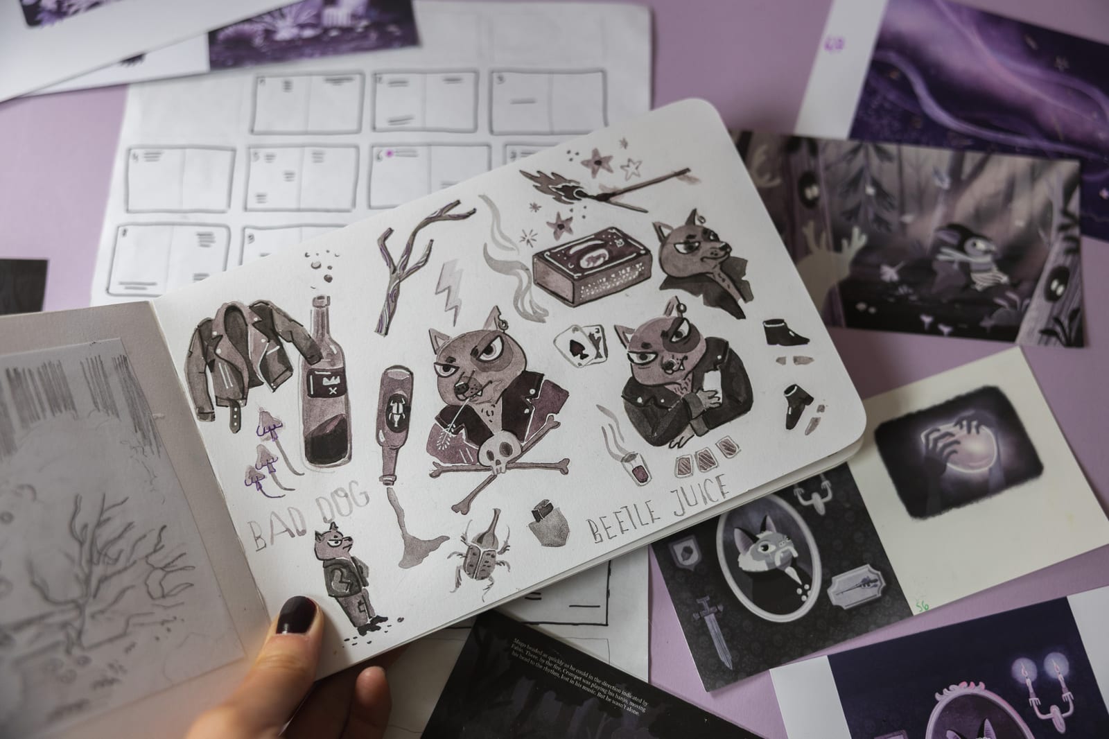 Mugo's Universe book photographed open, detail of illustrations by Asia Orlando.